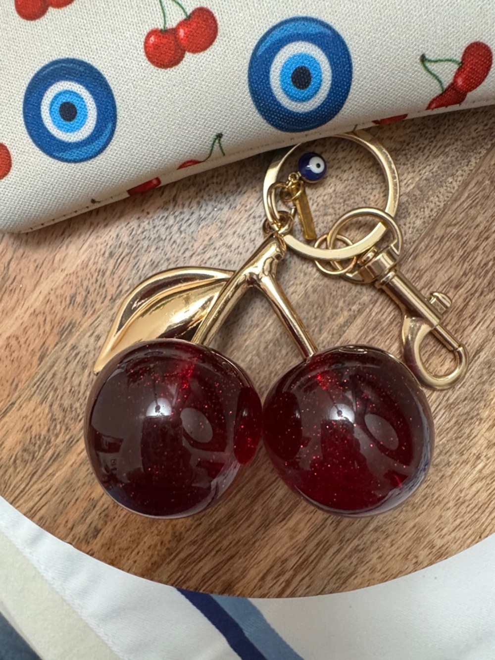 Fashionably Protected Cherry & Evil Eye Wristlet Pouch – Cream - Picture 9 of 9